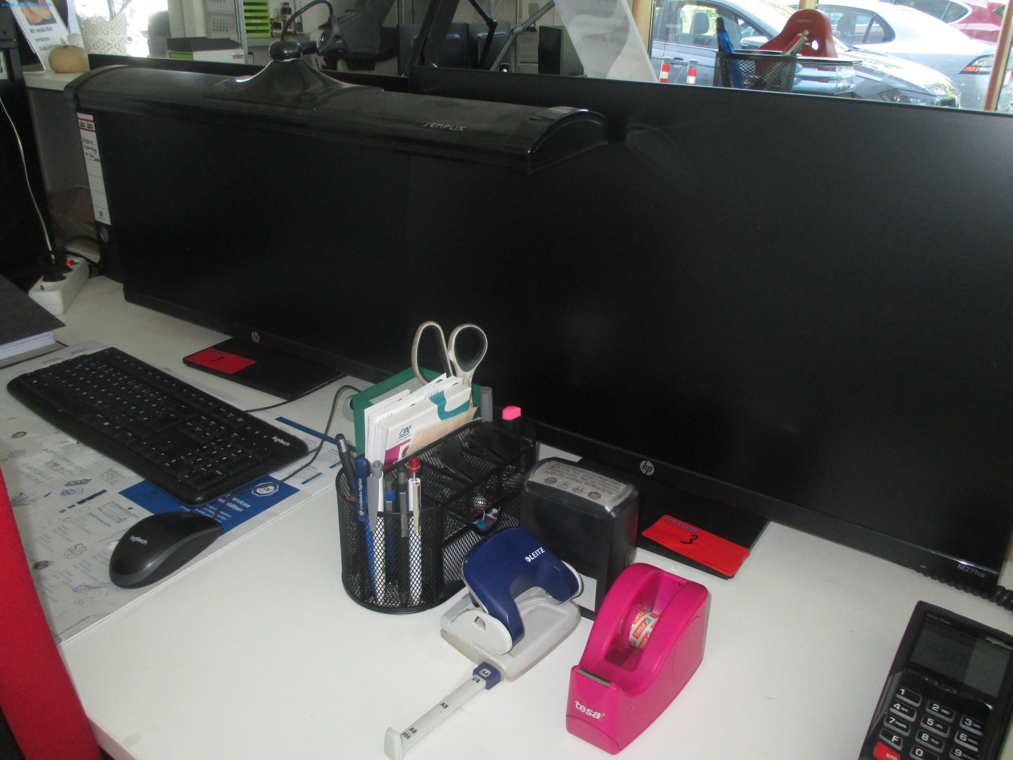 Passenger cars, electric cars, and automotive repair shop equipment at a Fiat dealership-1