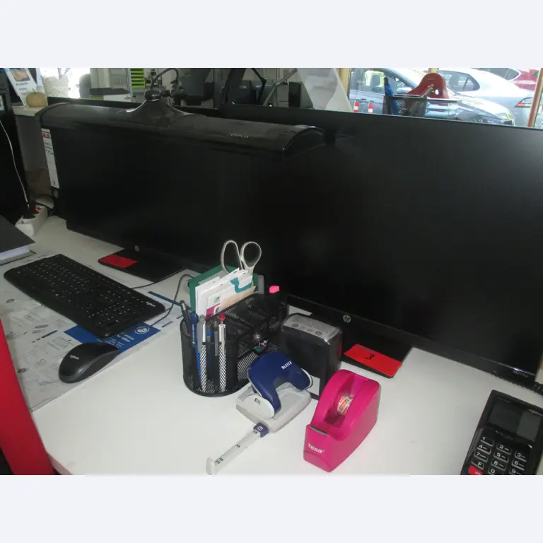 Passenger cars, electric cars, and automotive repair shop equipment at a Fiat dealership-1