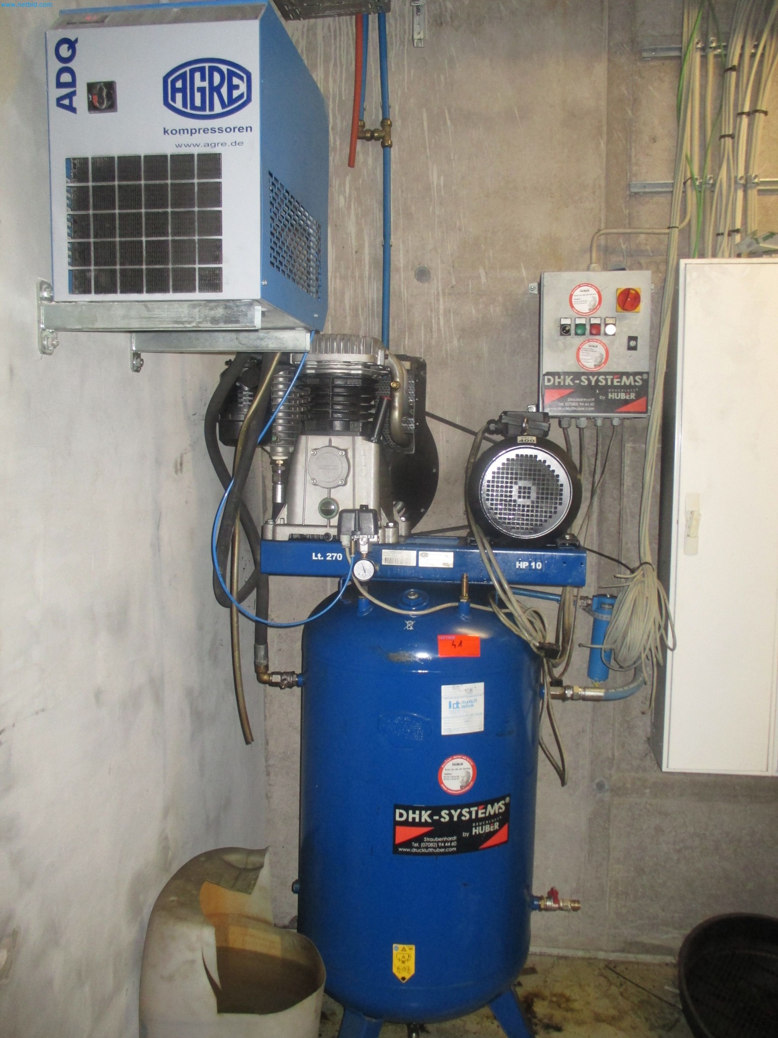 Passenger cars, electric cars, and automotive repair shop equipment at a Fiat dealership-1