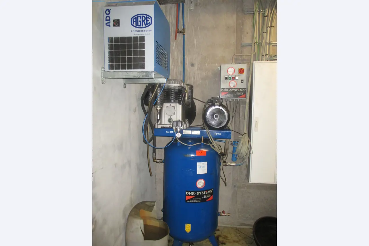 Passenger cars, electric cars, and automotive repair shop equipment at a Fiat dealership-1