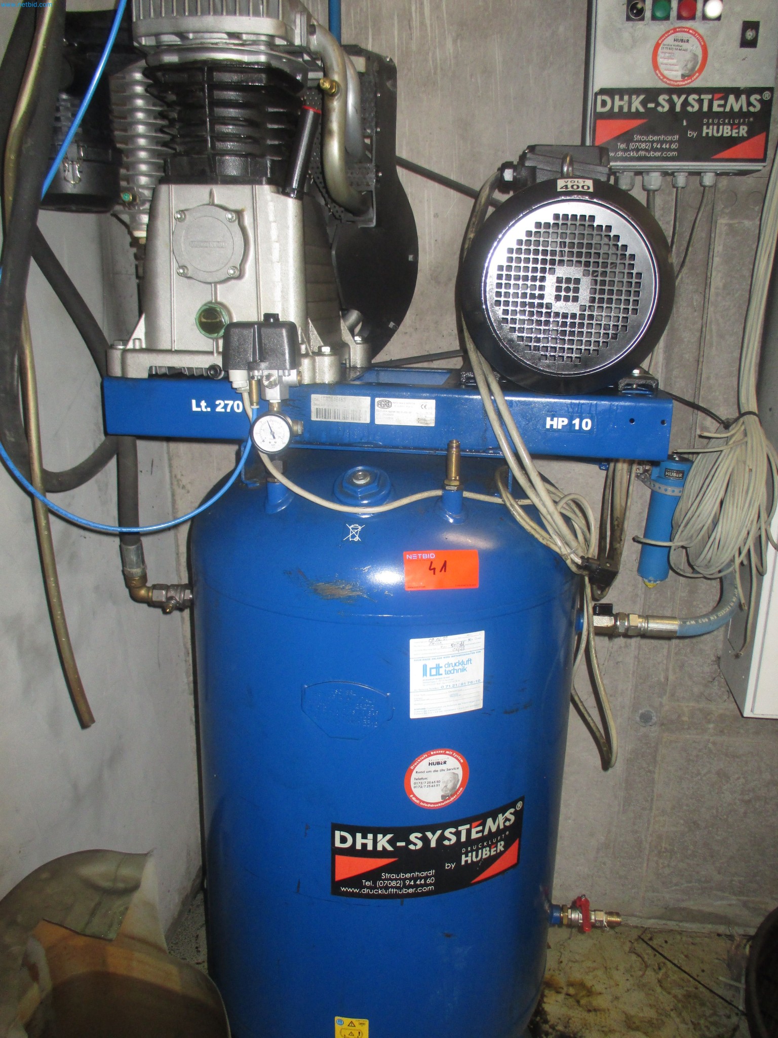 Passenger cars, electric cars, and automotive repair shop equipment at a Fiat dealership-2