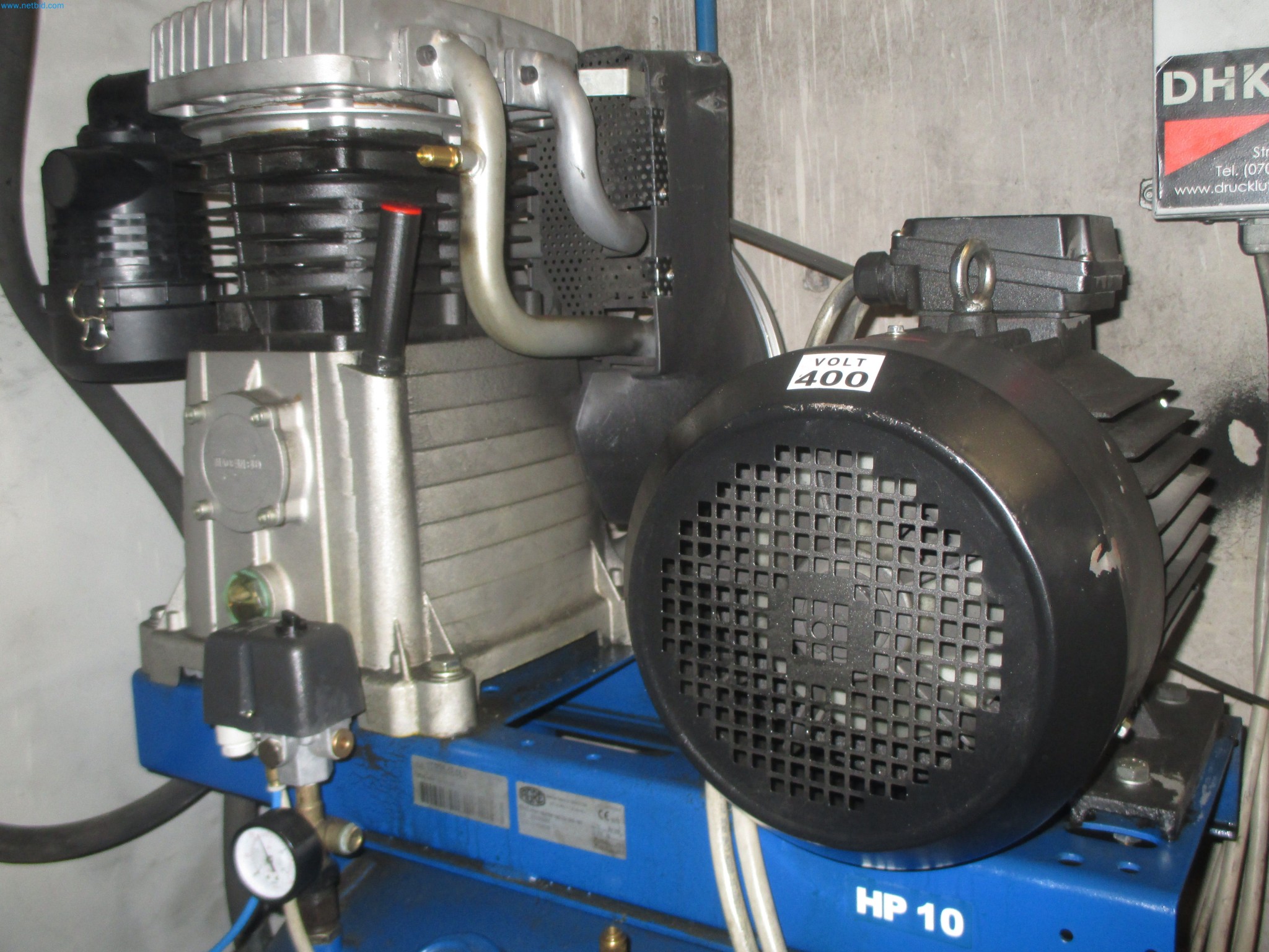 Passenger cars, electric cars, and automotive repair shop equipment at a Fiat dealership-6