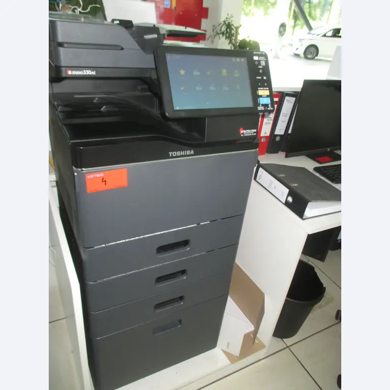 Passenger cars, electric cars, and automotive repair shop equipment at a Fiat dealership-1