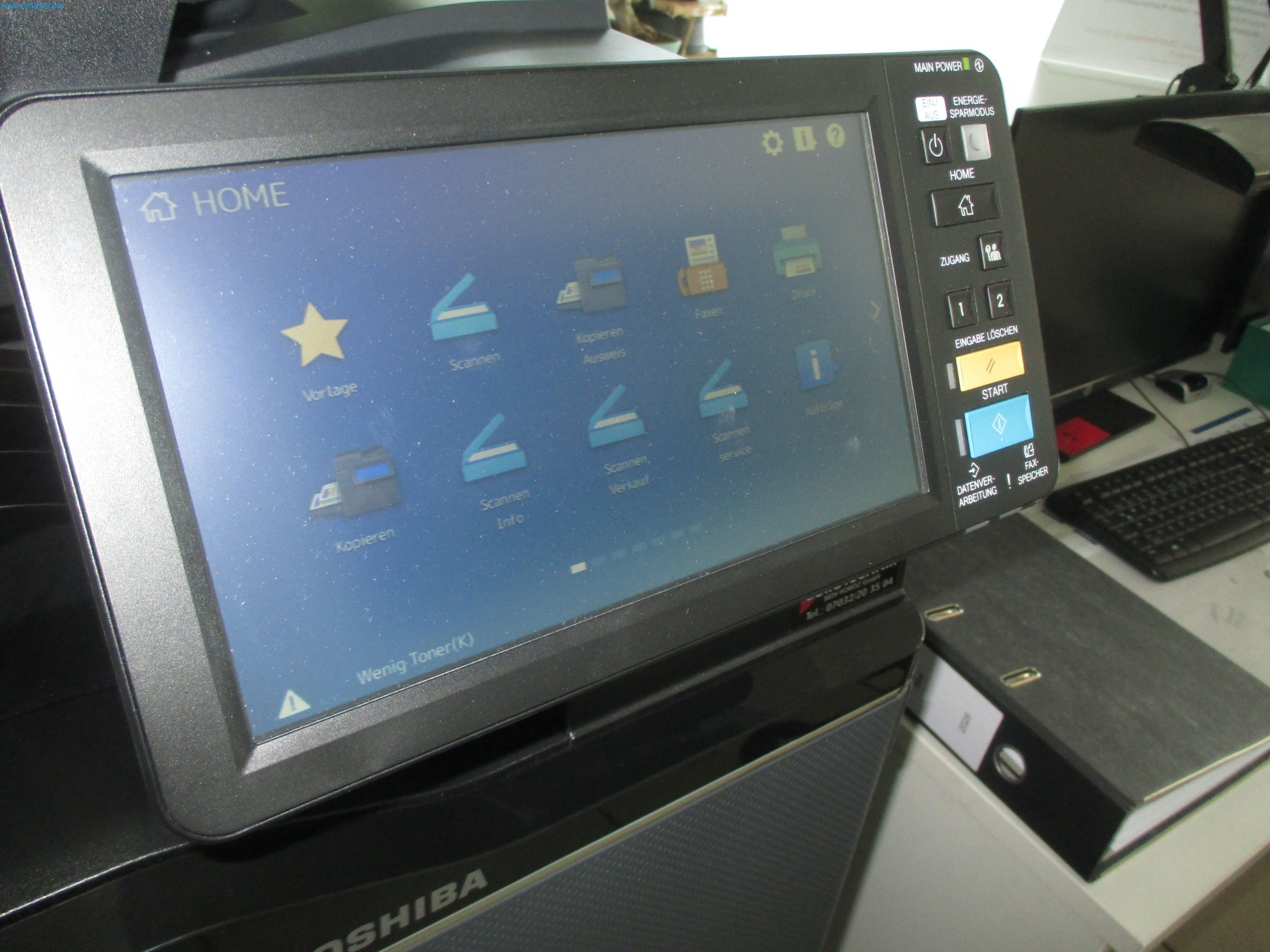 Passenger cars, electric cars, and automotive repair shop equipment at a Fiat dealership-3