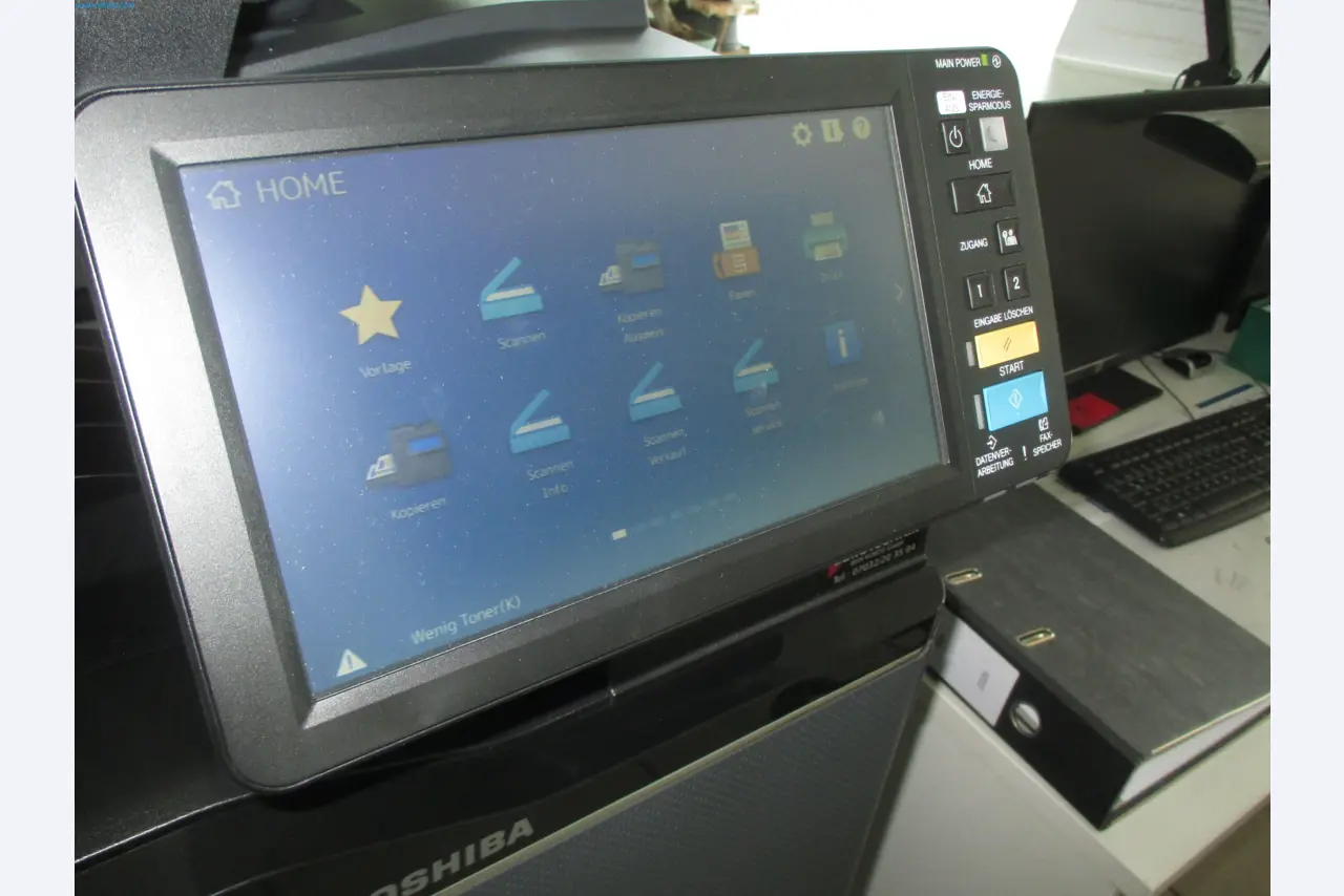 Passenger cars, electric cars, and automotive repair shop equipment at a Fiat dealership-3