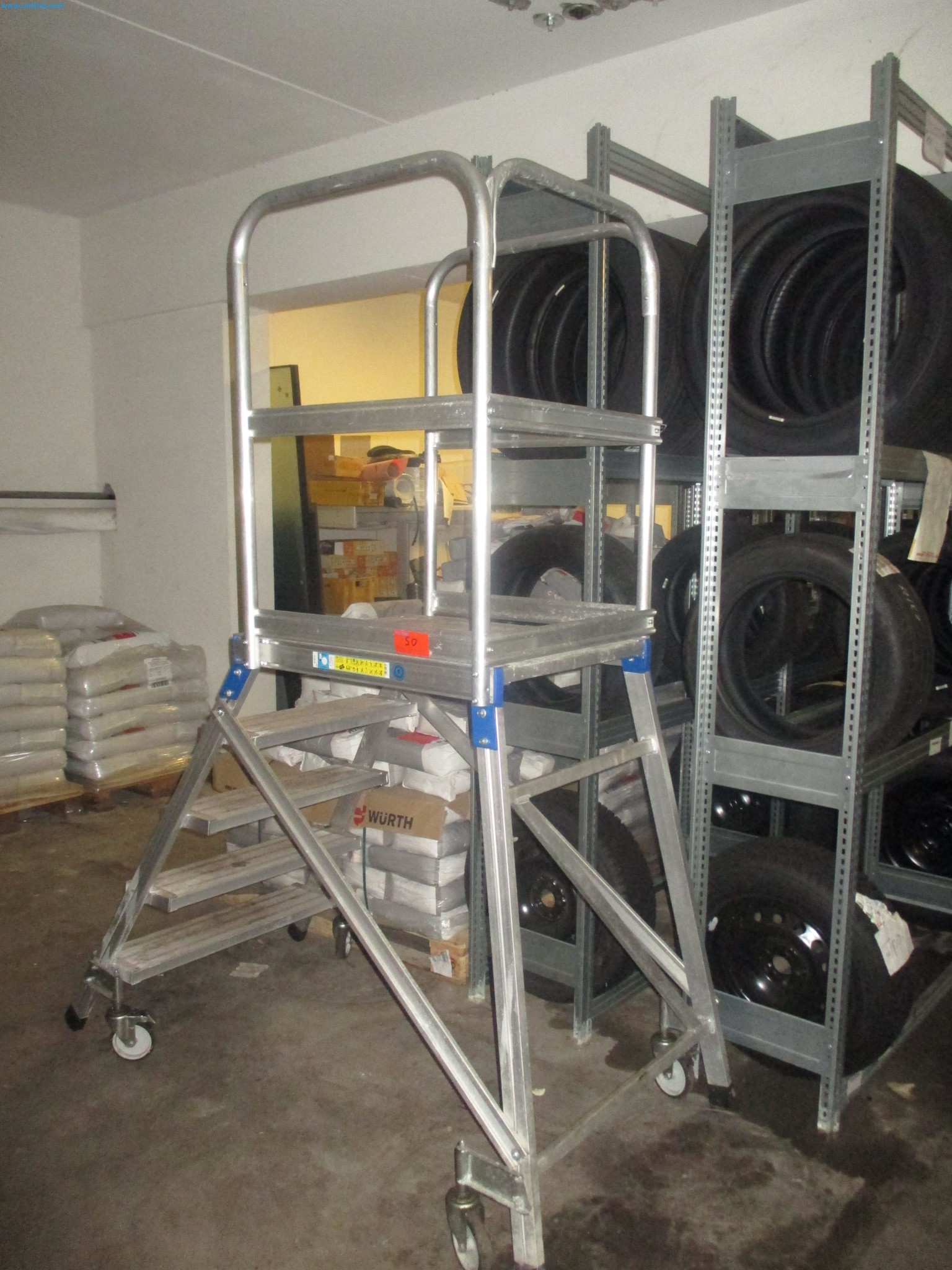 Passenger cars, electric cars, and automotive repair shop equipment at a Fiat dealership-1