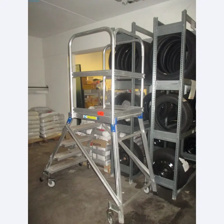Passenger cars, electric cars, and automotive repair shop equipment at a Fiat dealership-1