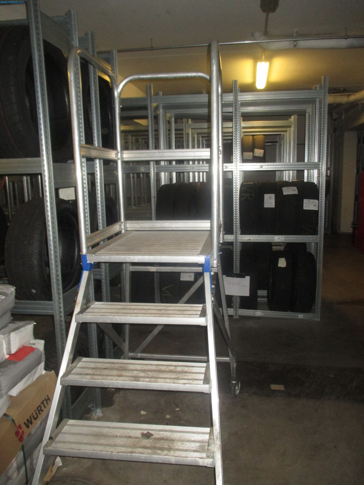 Passenger cars, electric cars, and automotive repair shop equipment at a Fiat dealership-2