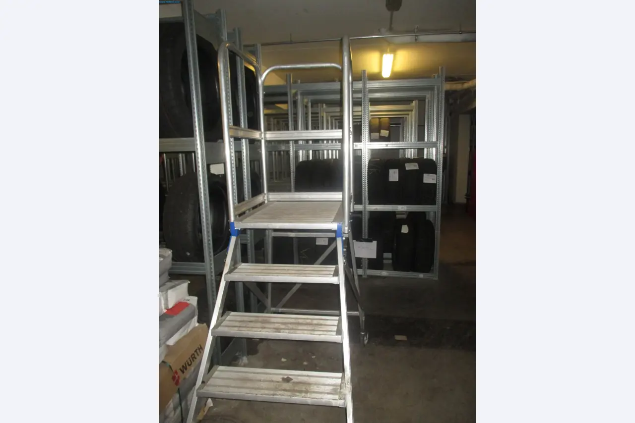 Passenger cars, electric cars, and automotive repair shop equipment at a Fiat dealership-2