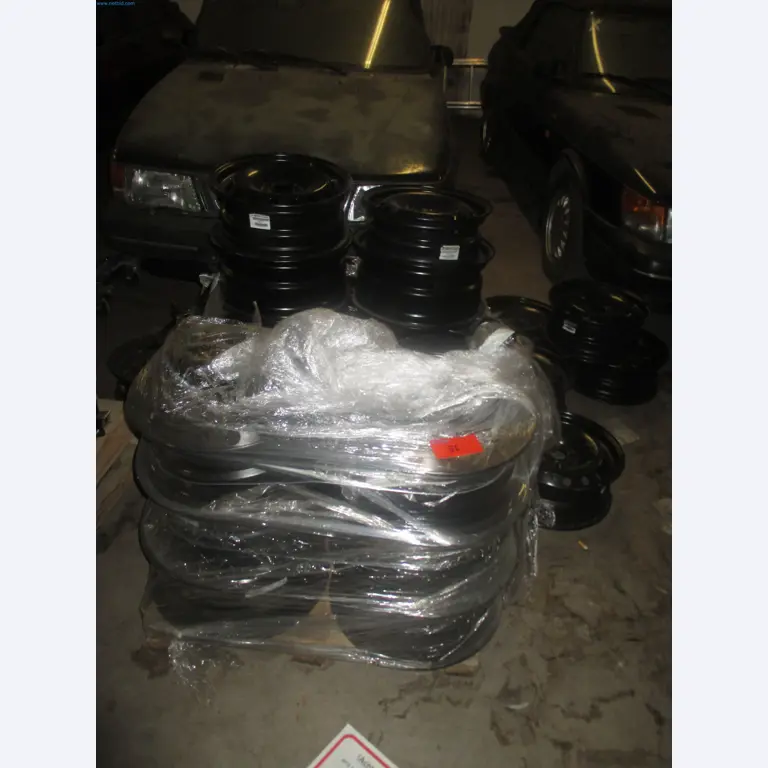 Passenger cars, electric cars, and automotive repair shop equipment at a Fiat dealership-1