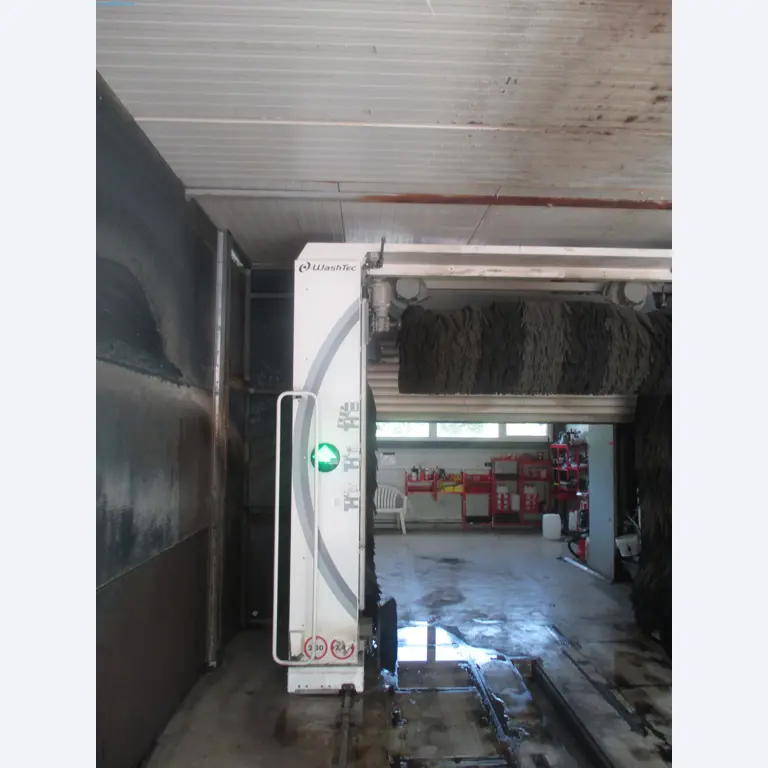 Passenger cars, electric cars, and automotive repair shop equipment at a Fiat dealership-2