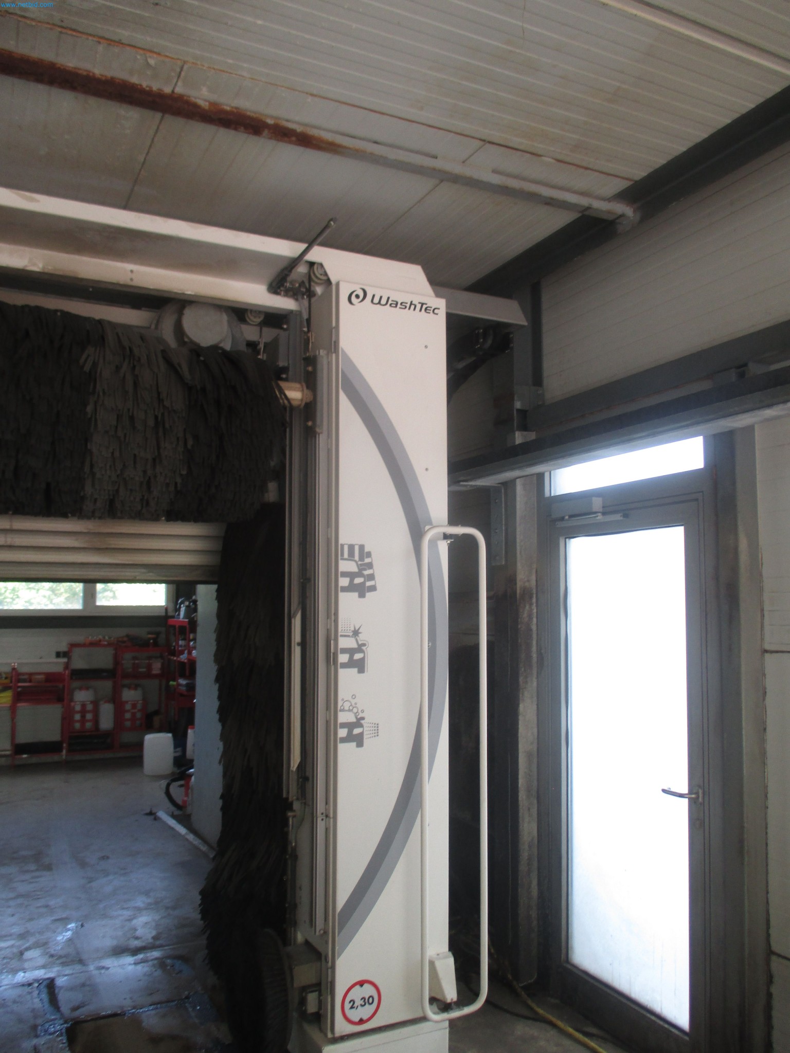 Passenger cars, electric cars, and automotive repair shop equipment at a Fiat dealership-3