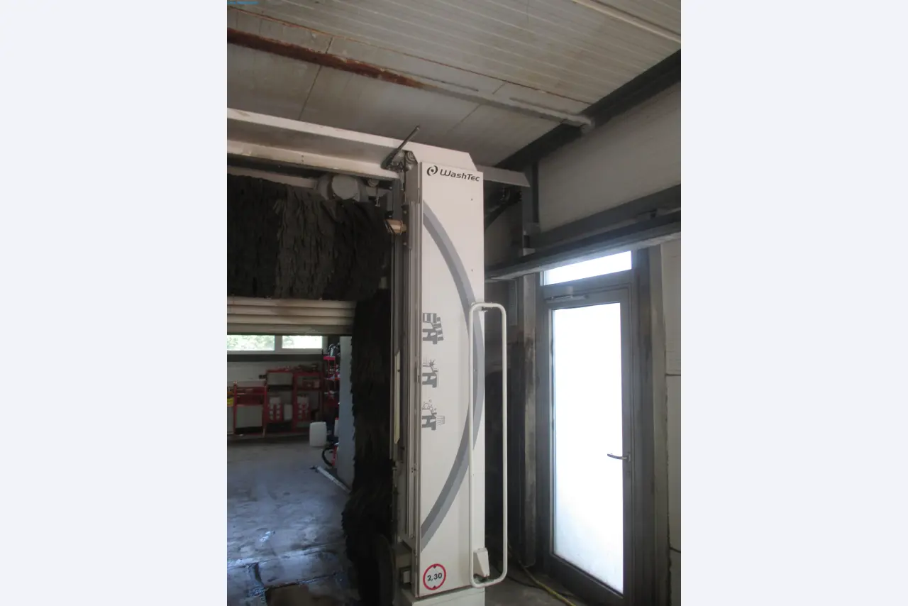 Passenger cars, electric cars, and automotive repair shop equipment at a Fiat dealership-3