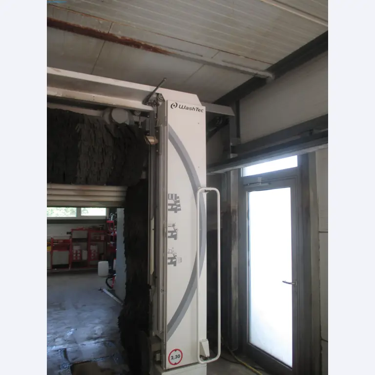 Passenger cars, electric cars, and automotive repair shop equipment at a Fiat dealership-3
