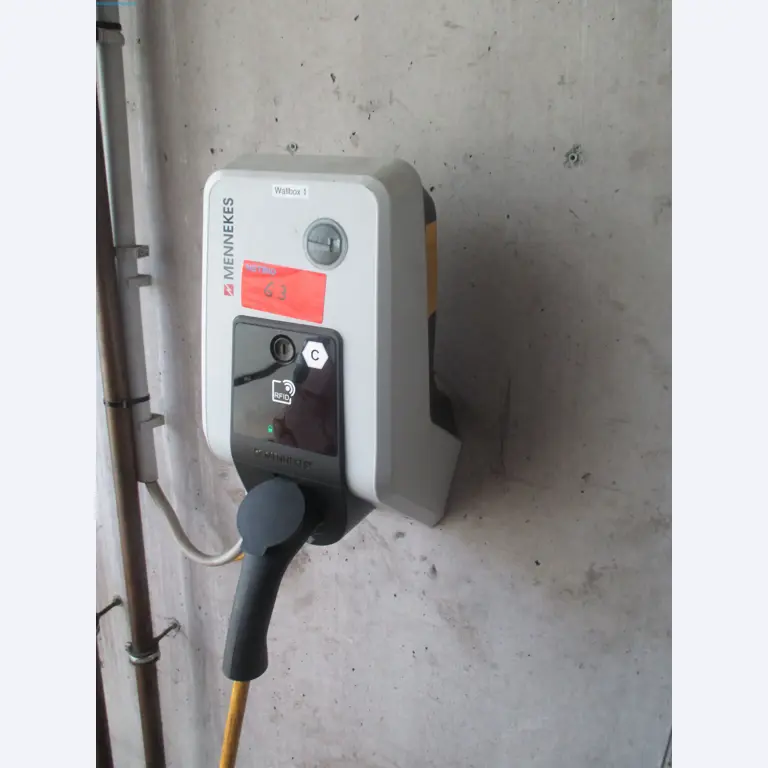 Passenger cars, electric cars, and automotive repair shop equipment at a Fiat dealership-2