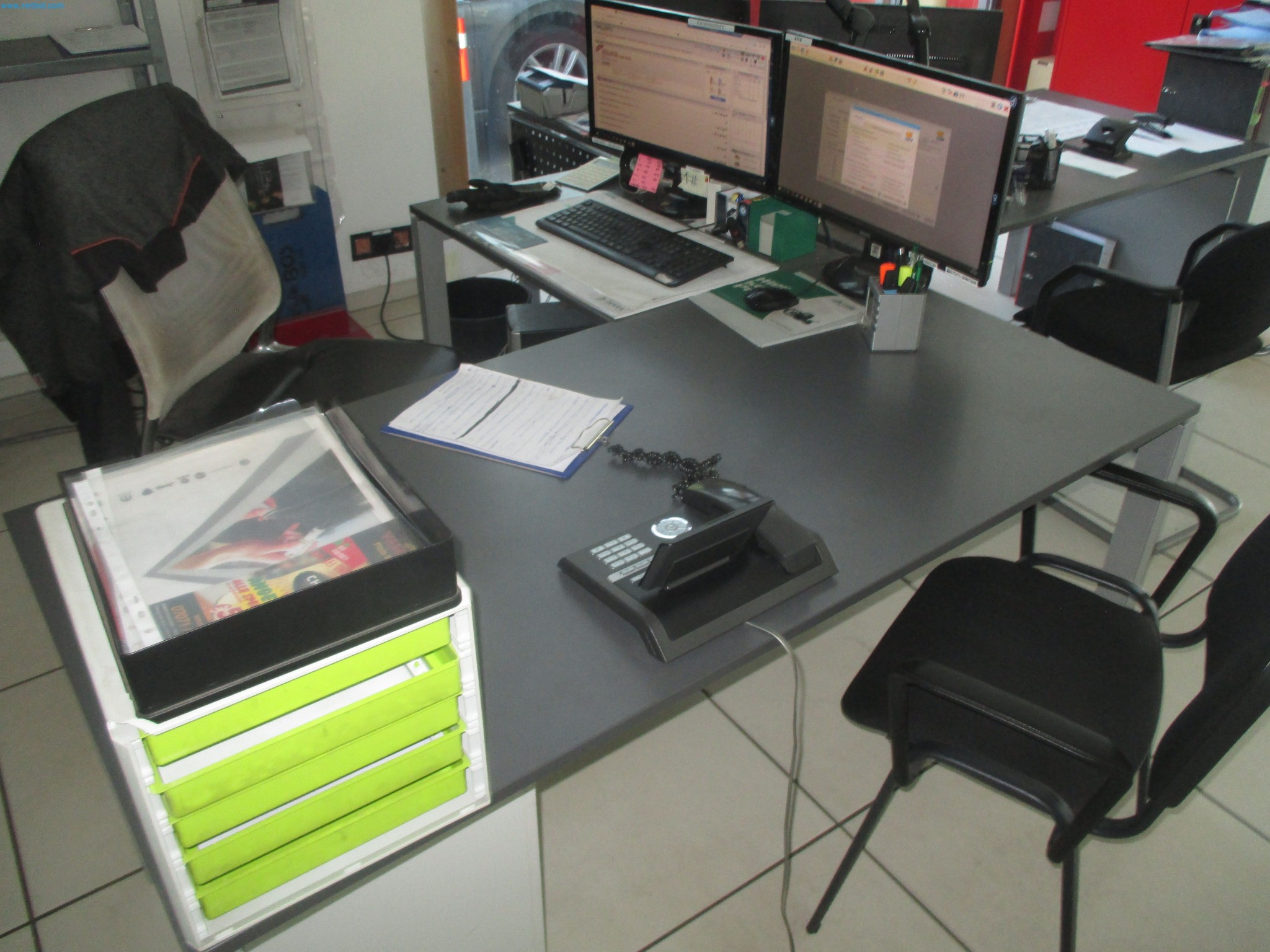Passenger cars, electric cars, and automotive repair shop equipment at a Fiat dealership-3