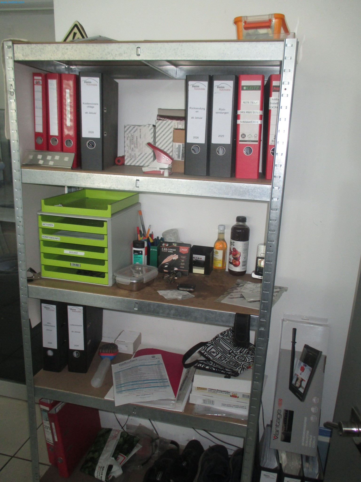 Passenger cars, electric cars, and automotive repair shop equipment at a Fiat dealership-5