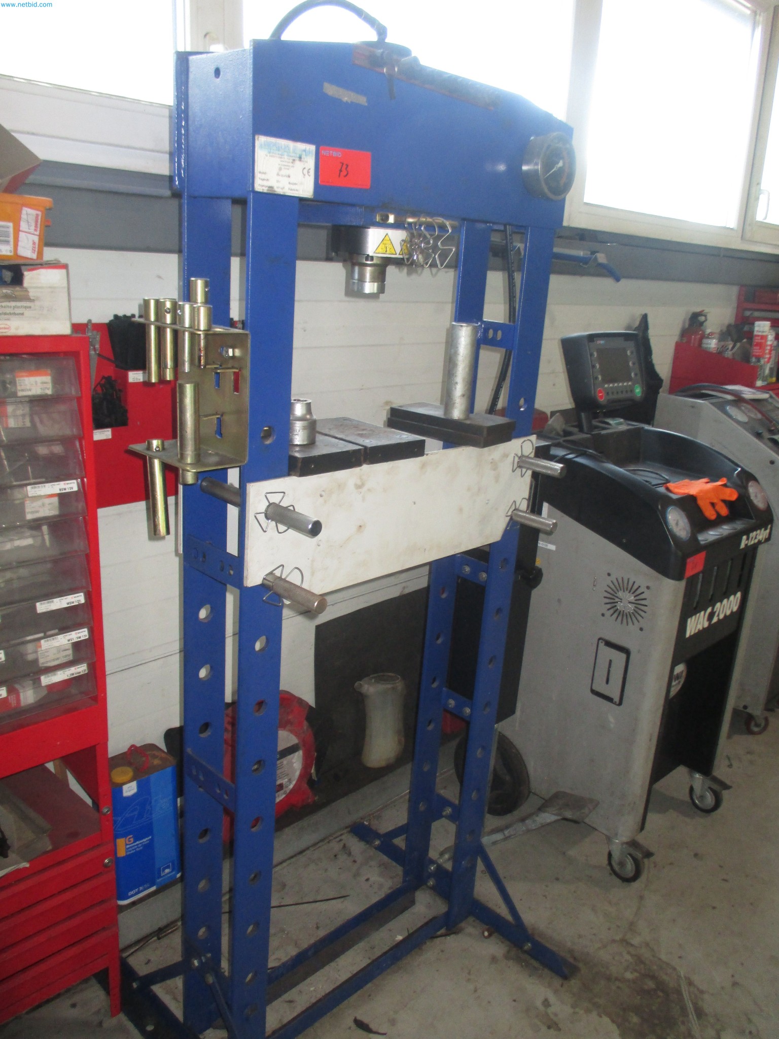 Passenger cars, electric cars, and automotive repair shop equipment at a Fiat dealership-1