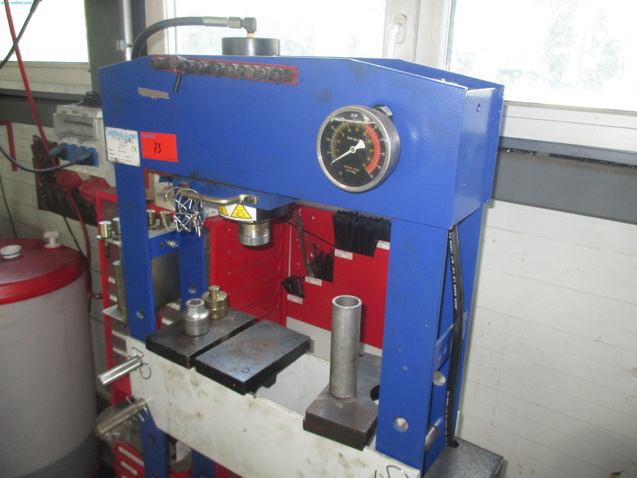 Passenger cars, electric cars, and automotive repair shop equipment at a Fiat dealership-3