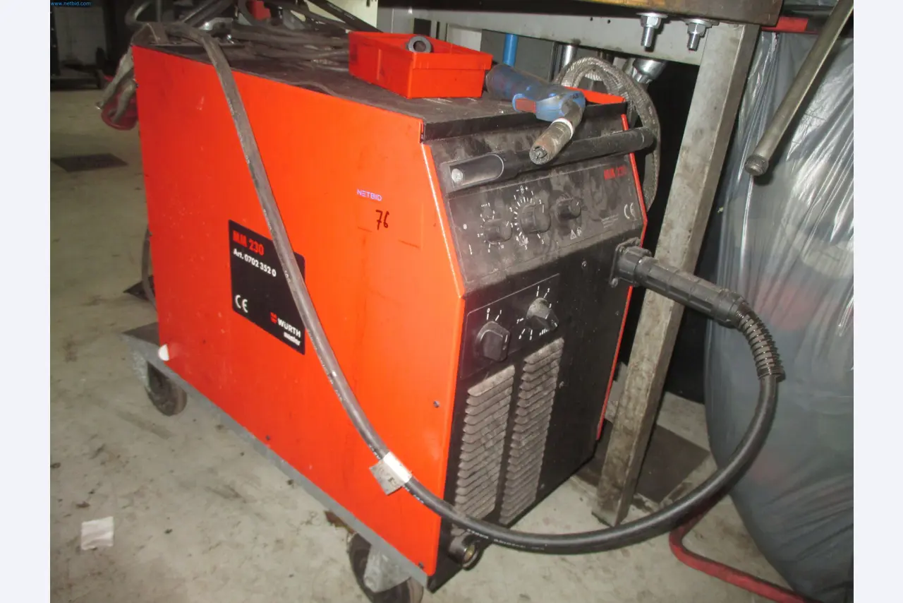 Passenger cars, electric cars, and automotive repair shop equipment at a Fiat dealership-1