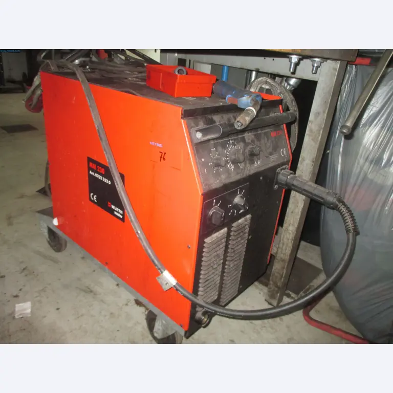 Passenger cars, electric cars, and automotive repair shop equipment at a Fiat dealership-1