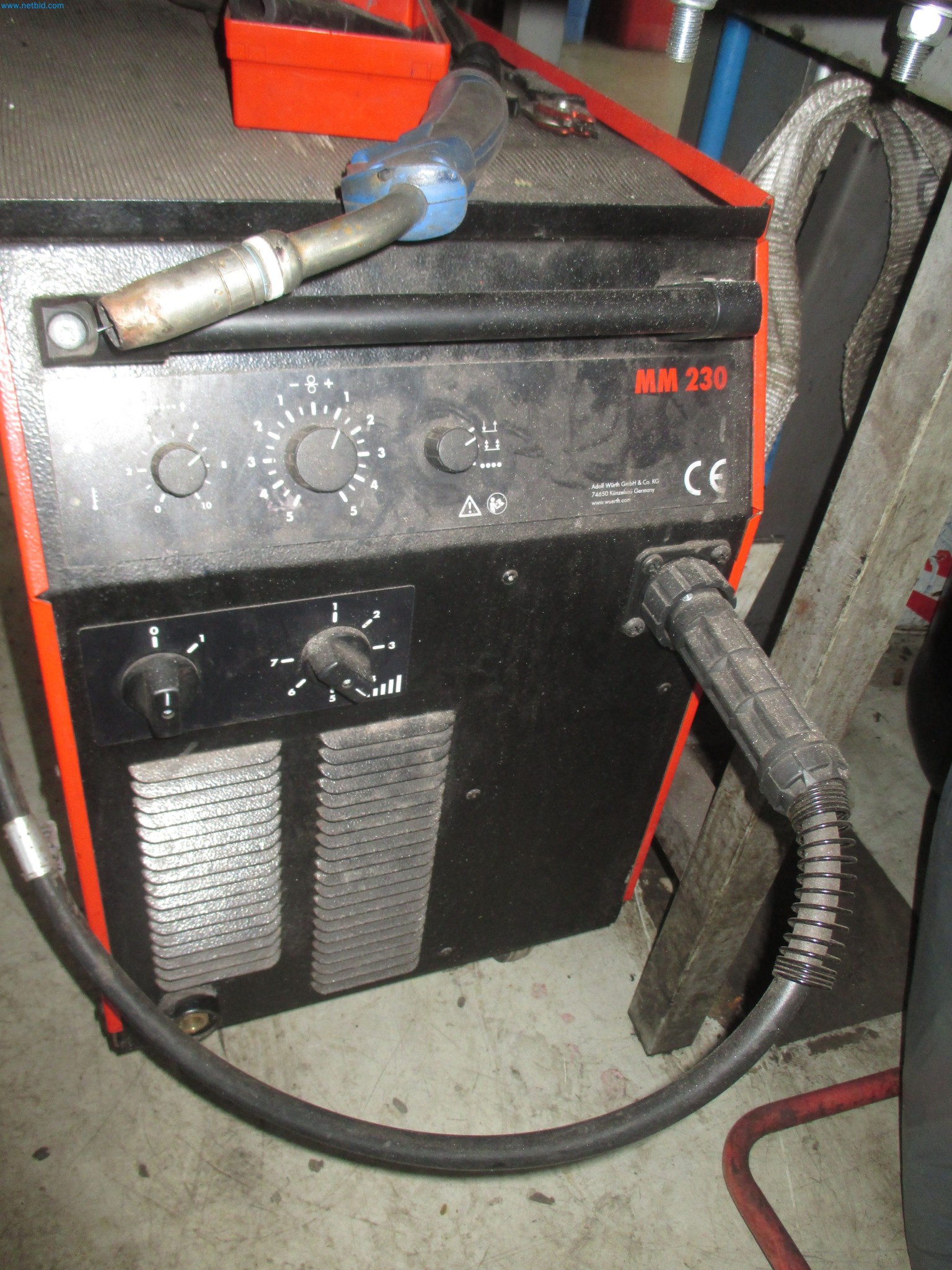 Passenger cars, electric cars, and automotive repair shop equipment at a Fiat dealership-2