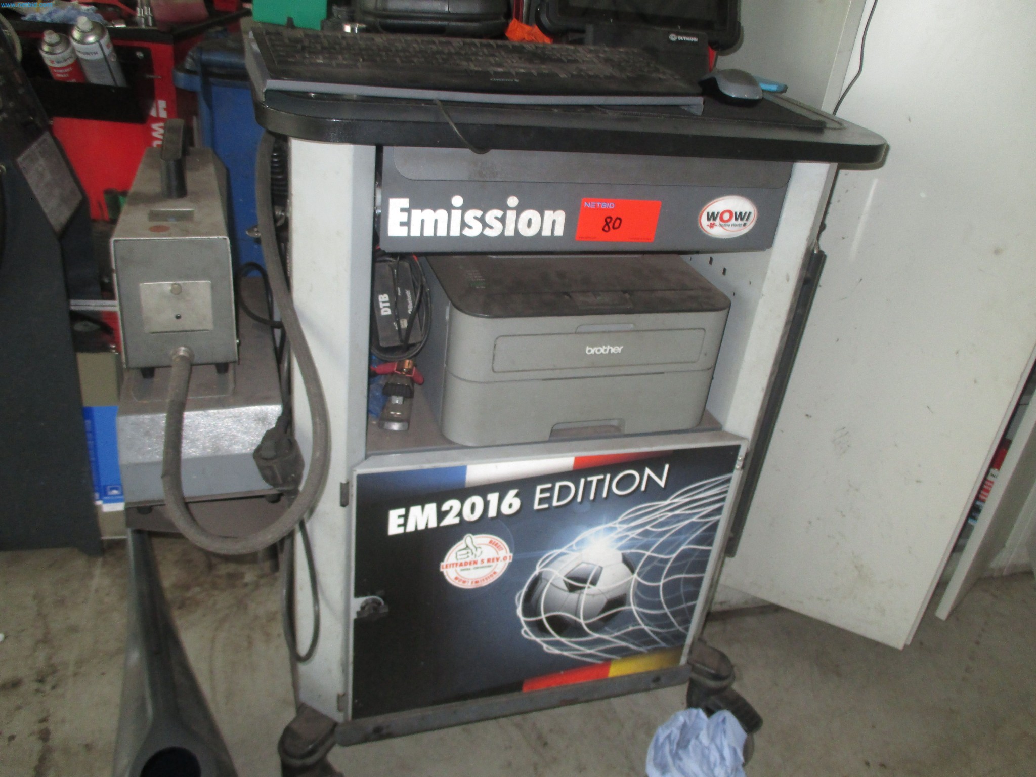 Passenger cars, electric cars, and automotive repair shop equipment at a Fiat dealership-1