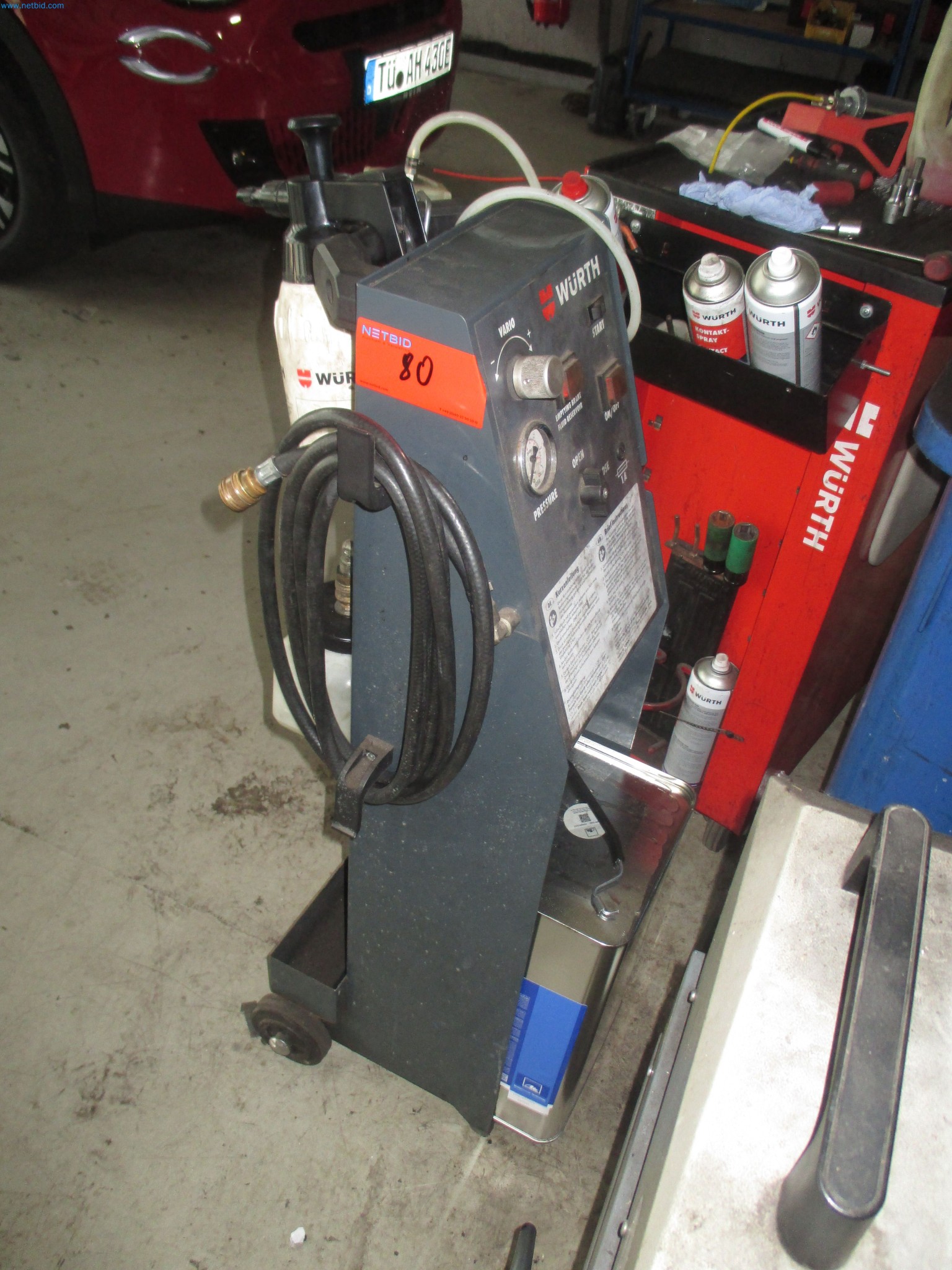Passenger cars, electric cars, and automotive repair shop equipment at a Fiat dealership-4