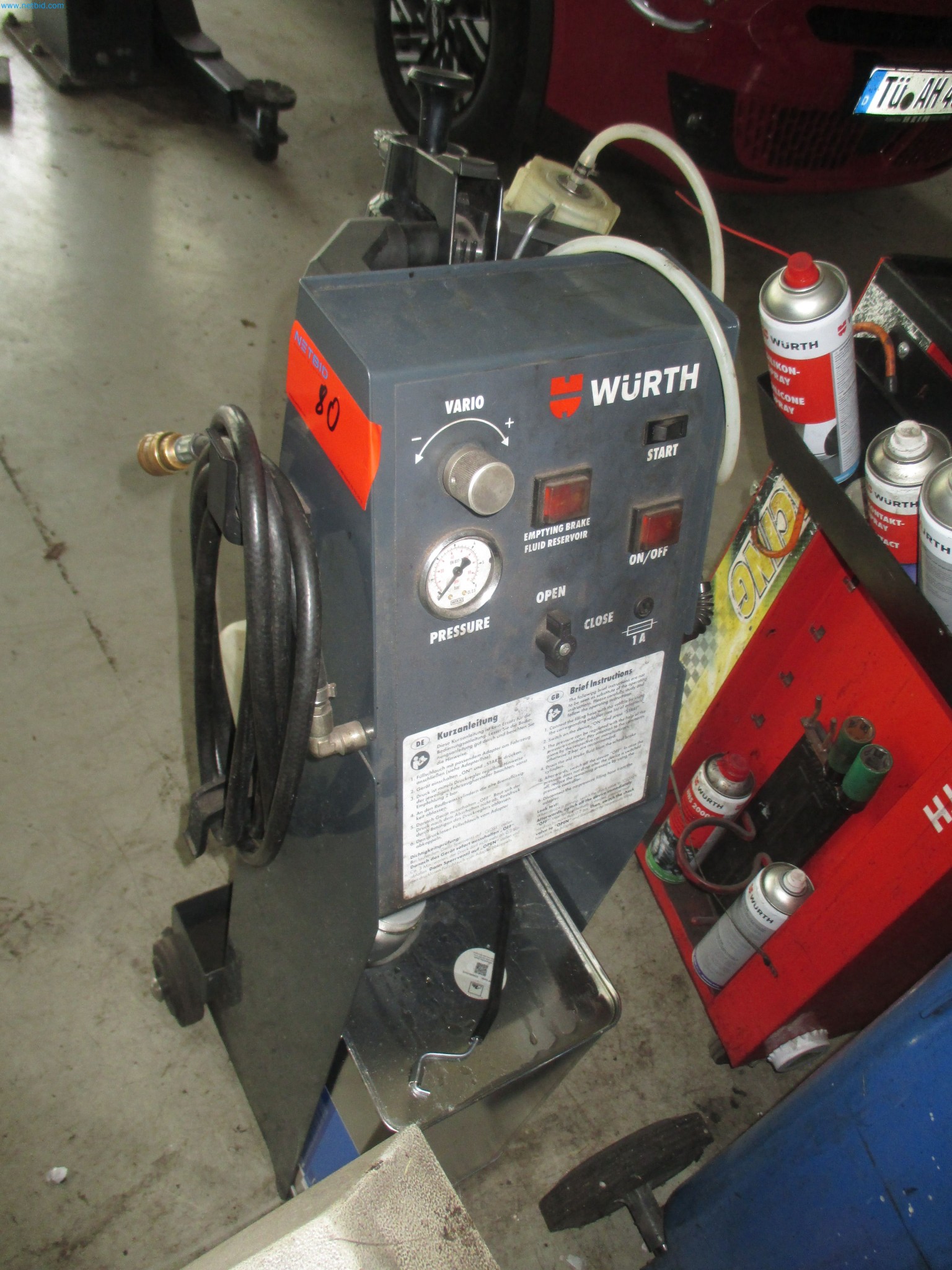 Passenger cars, electric cars, and automotive repair shop equipment at a Fiat dealership-5