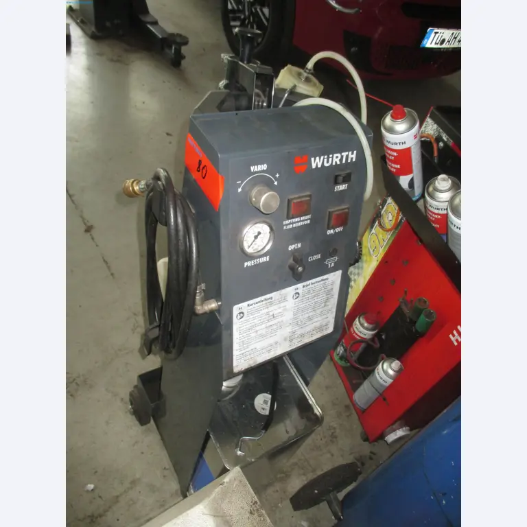 Passenger cars, electric cars, and automotive repair shop equipment at a Fiat dealership-5