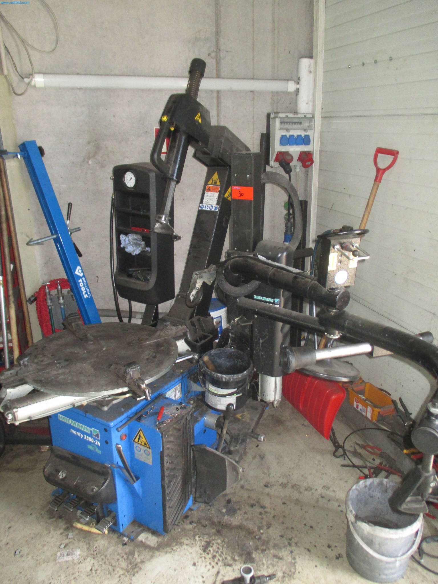 Passenger cars, electric cars, and automotive repair shop equipment at a Fiat dealership-2