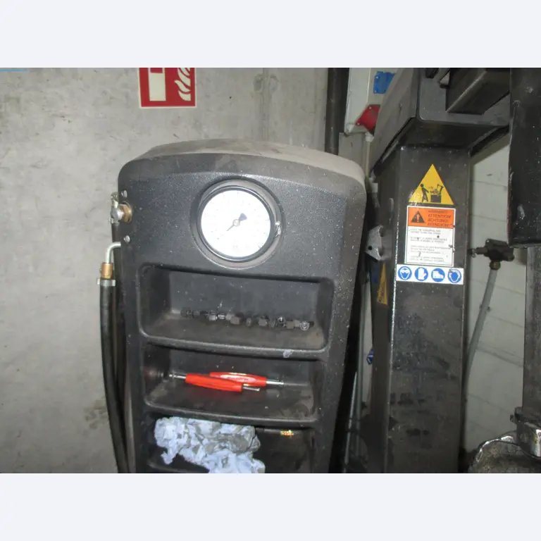 Passenger cars, electric cars, and automotive repair shop equipment at a Fiat dealership-3