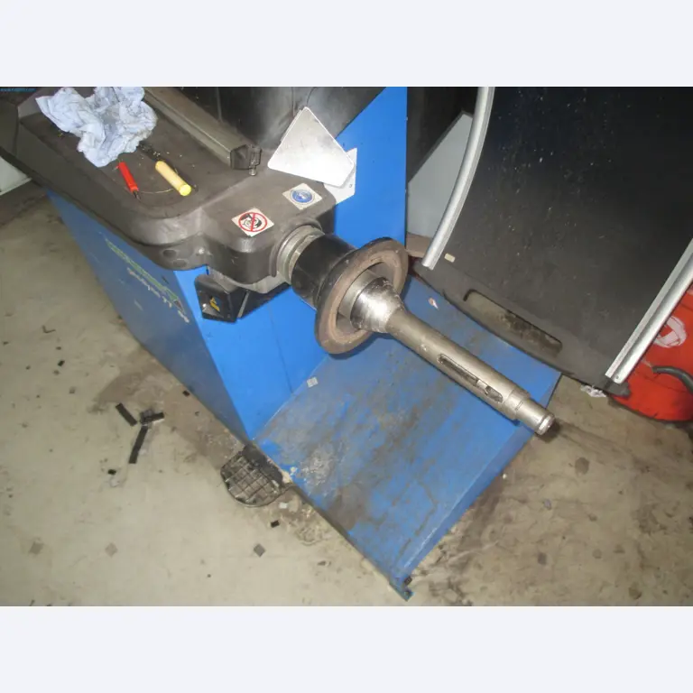 Passenger cars, electric cars, and automotive repair shop equipment at a Fiat dealership-4