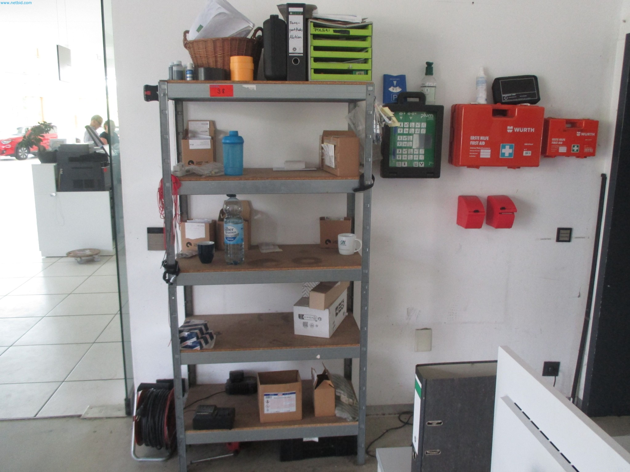 Passenger cars, electric cars, and automotive repair shop equipment at a Fiat dealership-2