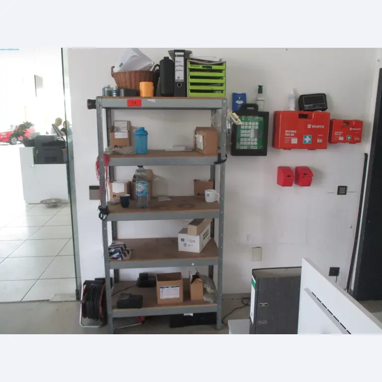 Passenger cars, electric cars, and automotive repair shop equipment at a Fiat dealership-2