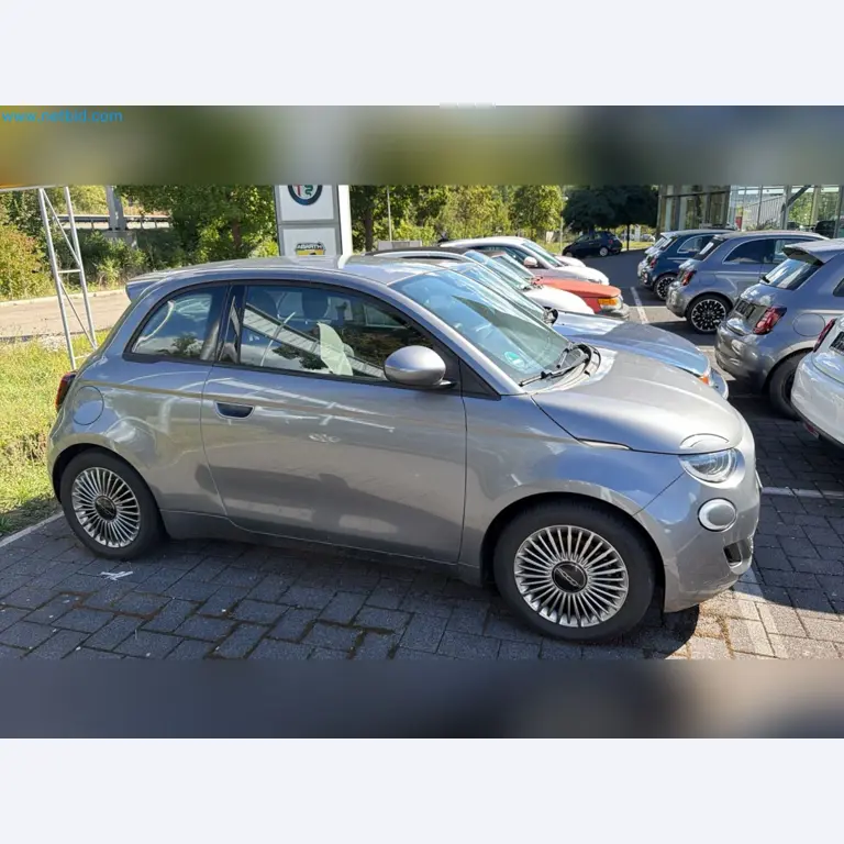 Passenger cars, electric cars, and automotive repair shop equipment at a Fiat dealership-2