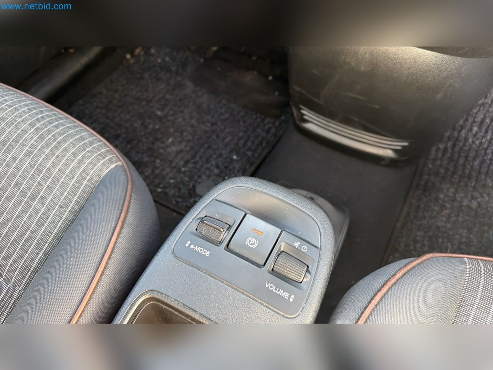 Passenger cars, electric cars, and automotive repair shop equipment at a Fiat dealership-9