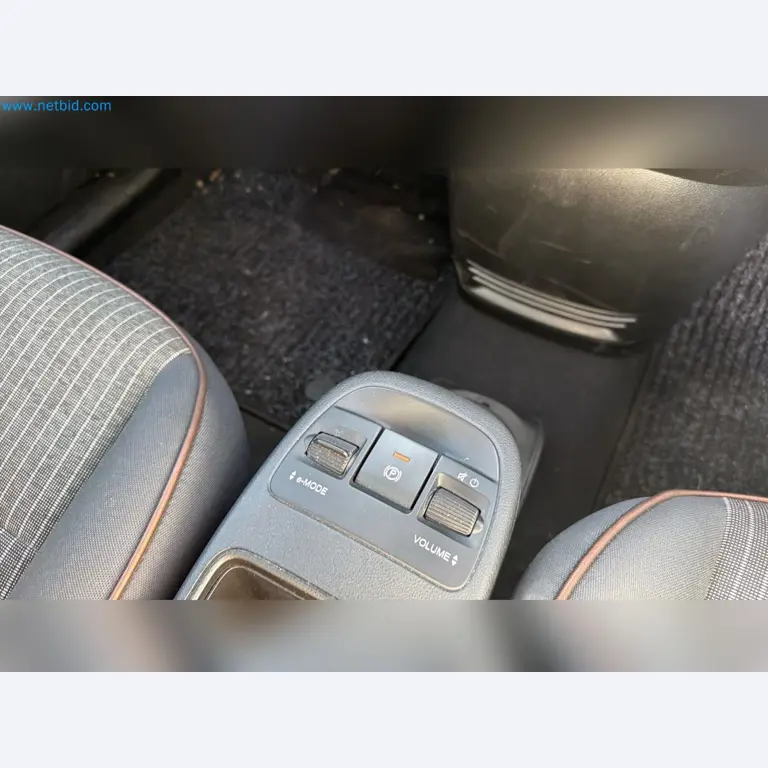 Passenger cars, electric cars, and automotive repair shop equipment at a Fiat dealership-9