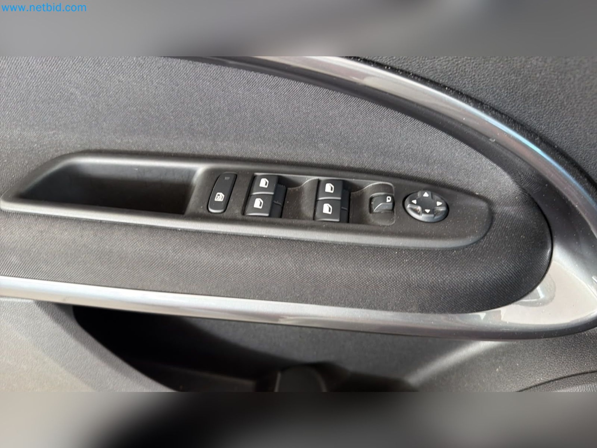 Passenger cars, electric cars, and automotive repair shop equipment at a Fiat dealership-9