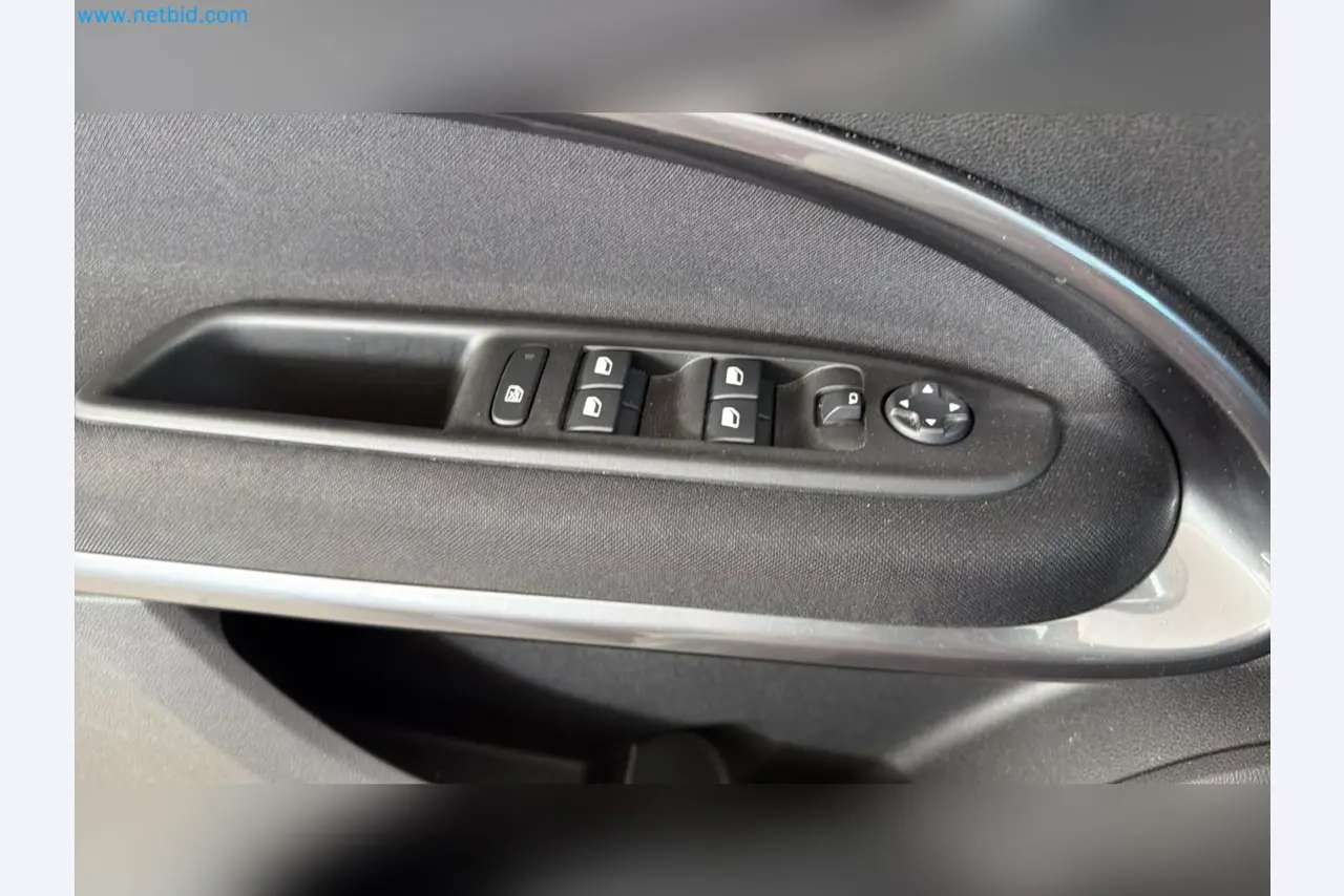 Passenger cars, electric cars, and automotive repair shop equipment at a Fiat dealership-9