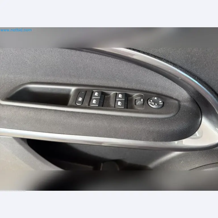 Passenger cars, electric cars, and automotive repair shop equipment at a Fiat dealership-9