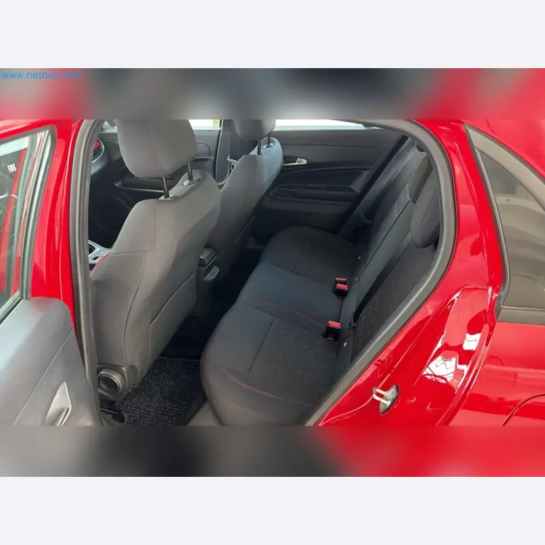 Passenger cars, electric cars, and automotive repair shop equipment at a Fiat dealership-12