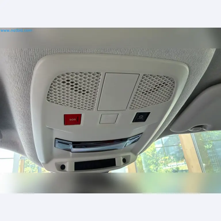 Passenger cars, electric cars, and automotive repair shop equipment at a Fiat dealership-14