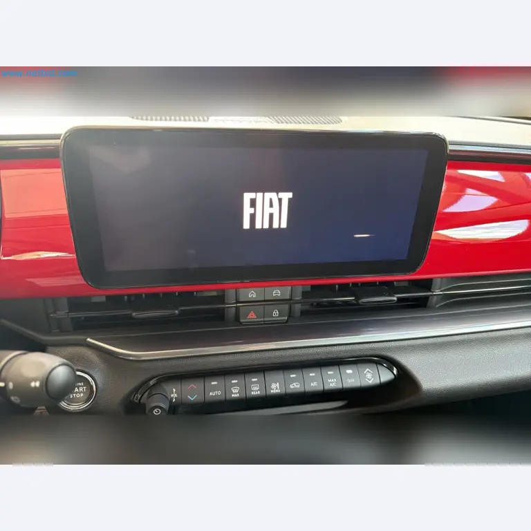 Passenger cars, electric cars, and automotive repair shop equipment at a Fiat dealership-15