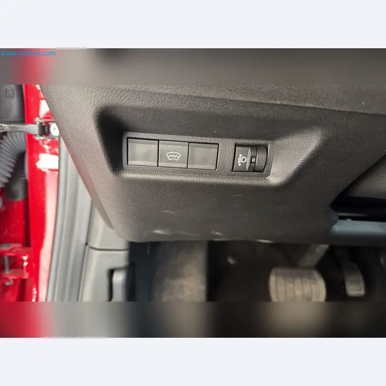 Passenger cars, electric cars, and automotive repair shop equipment at a Fiat dealership-16