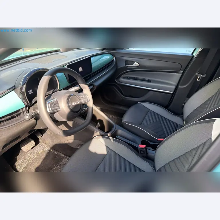 Passenger cars, electric cars, and automotive repair shop equipment at a Fiat dealership-10