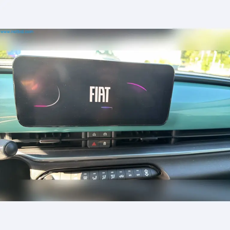 Passenger cars, electric cars, and automotive repair shop equipment at a Fiat dealership-11