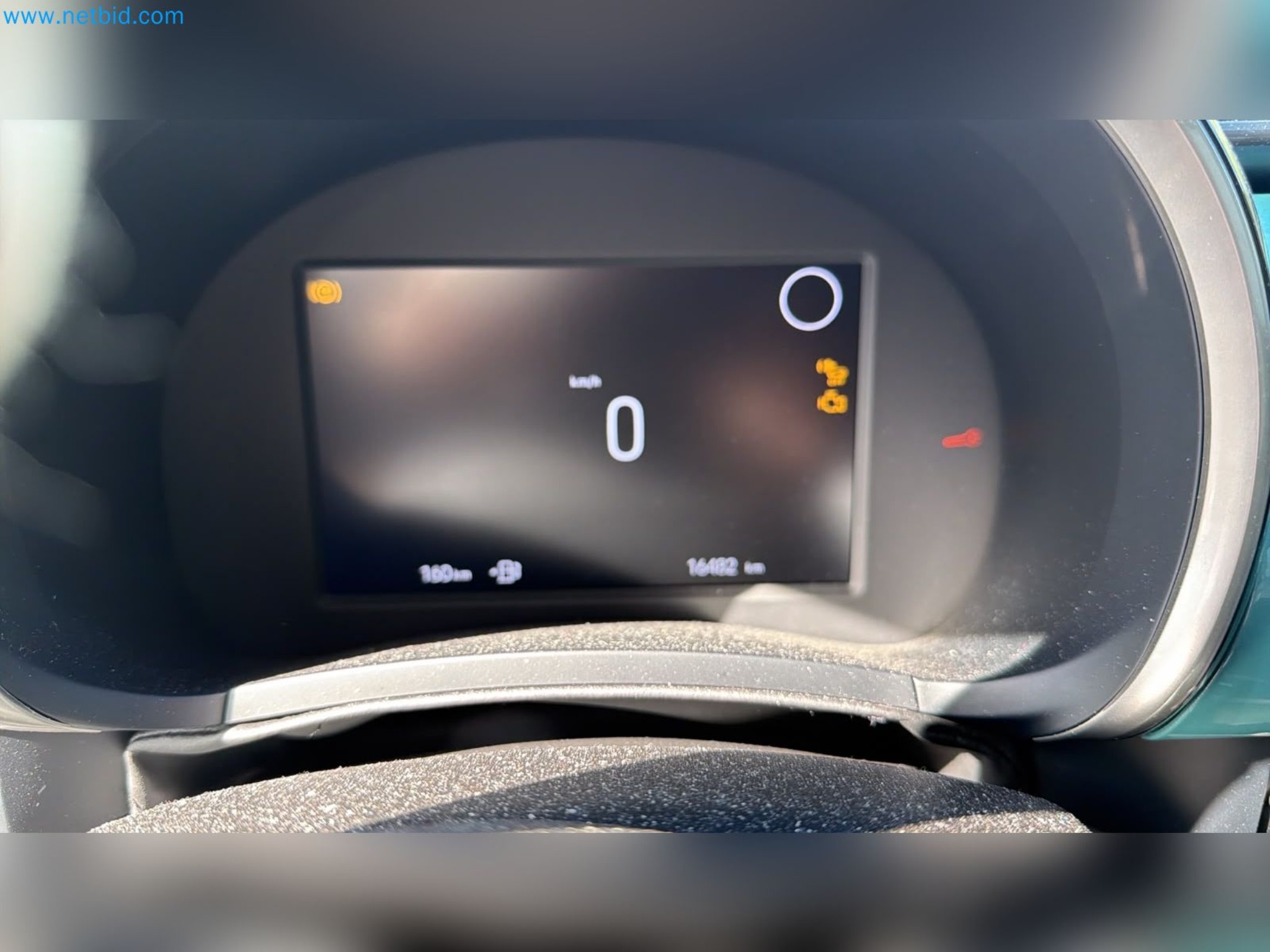 Passenger cars, electric cars, and automotive repair shop equipment at a Fiat dealership-7