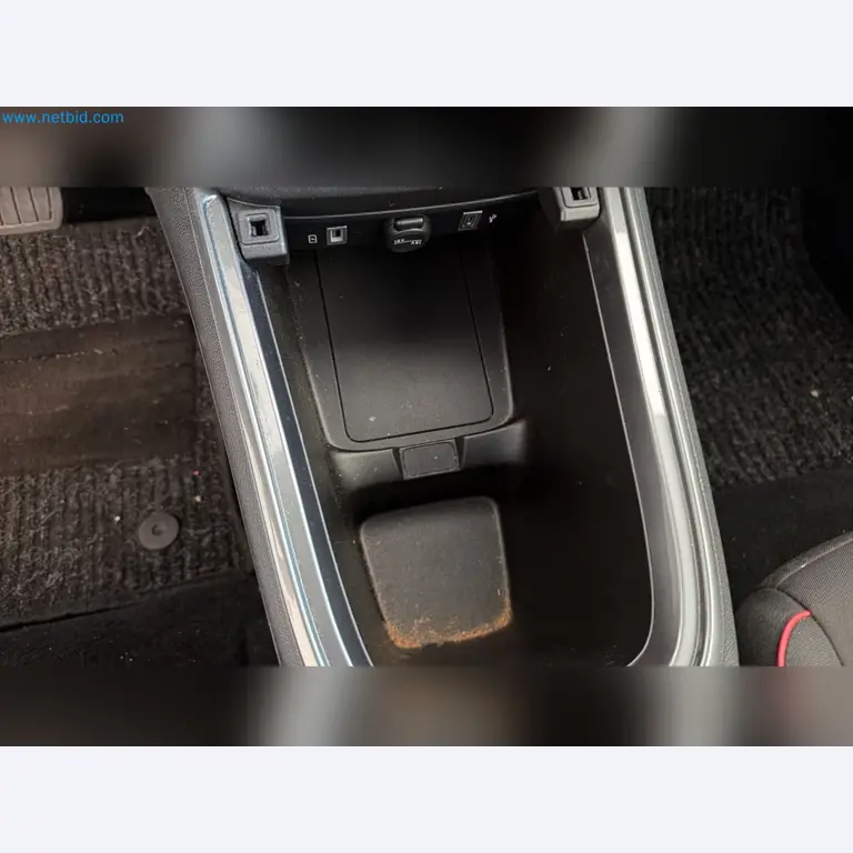 Passenger cars, electric cars, and automotive repair shop equipment at a Fiat dealership-8