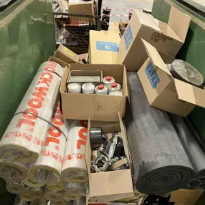 Container of various sized insulation rolls